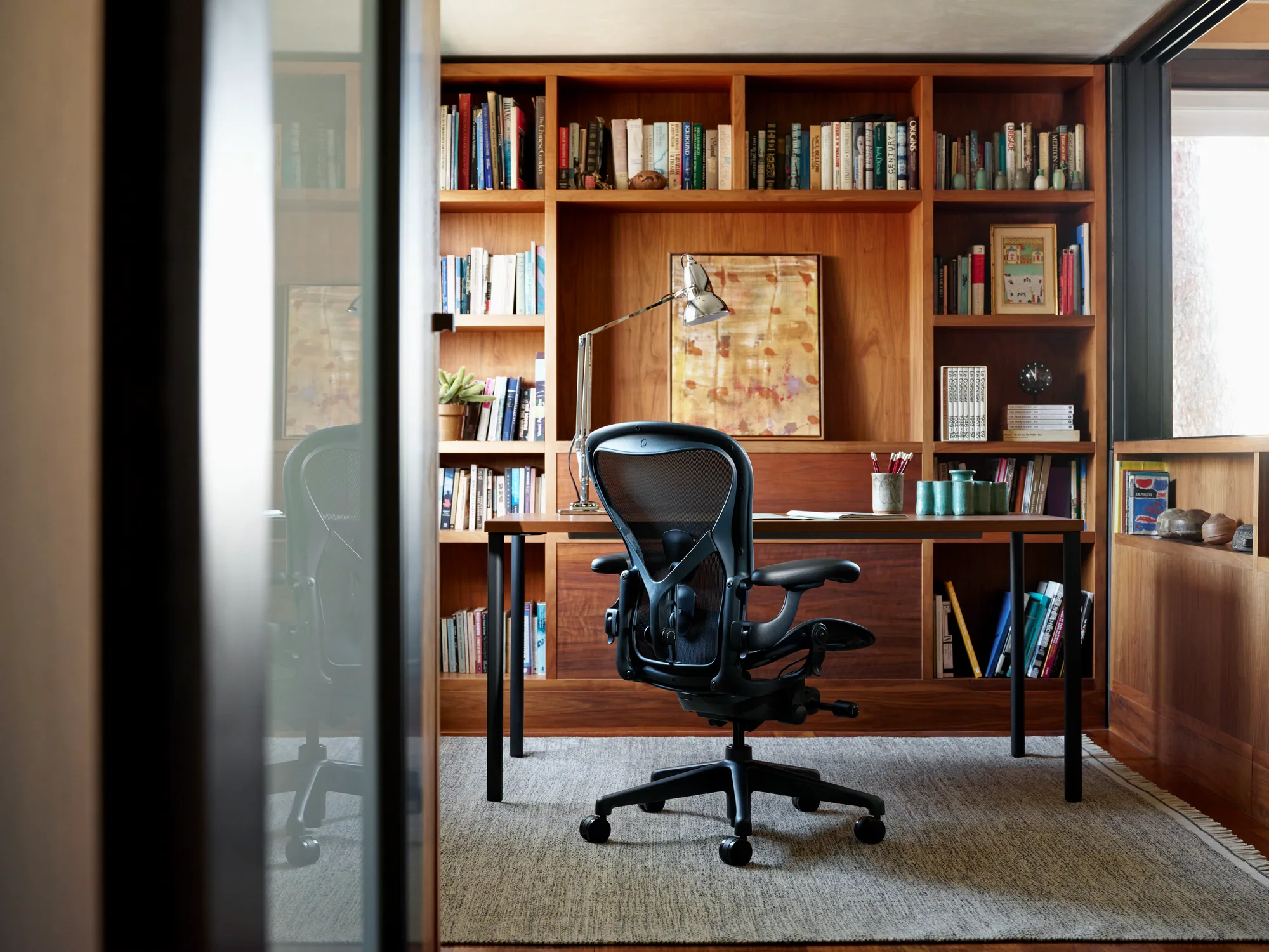 Herman Miller Aeron Chair: Ergonomic mesh office chair with PostureFit SL back support, offered in three sizes (6 of 8)